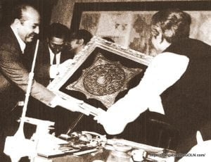 Bangabandhu Sheikh Mujibur Rahman presented with a calligraphy of the Holy Quran by the delegates of a visiting Egyptian trade mission.